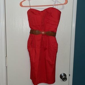 Red/orange strapless dress. Can be worn with or without belt.